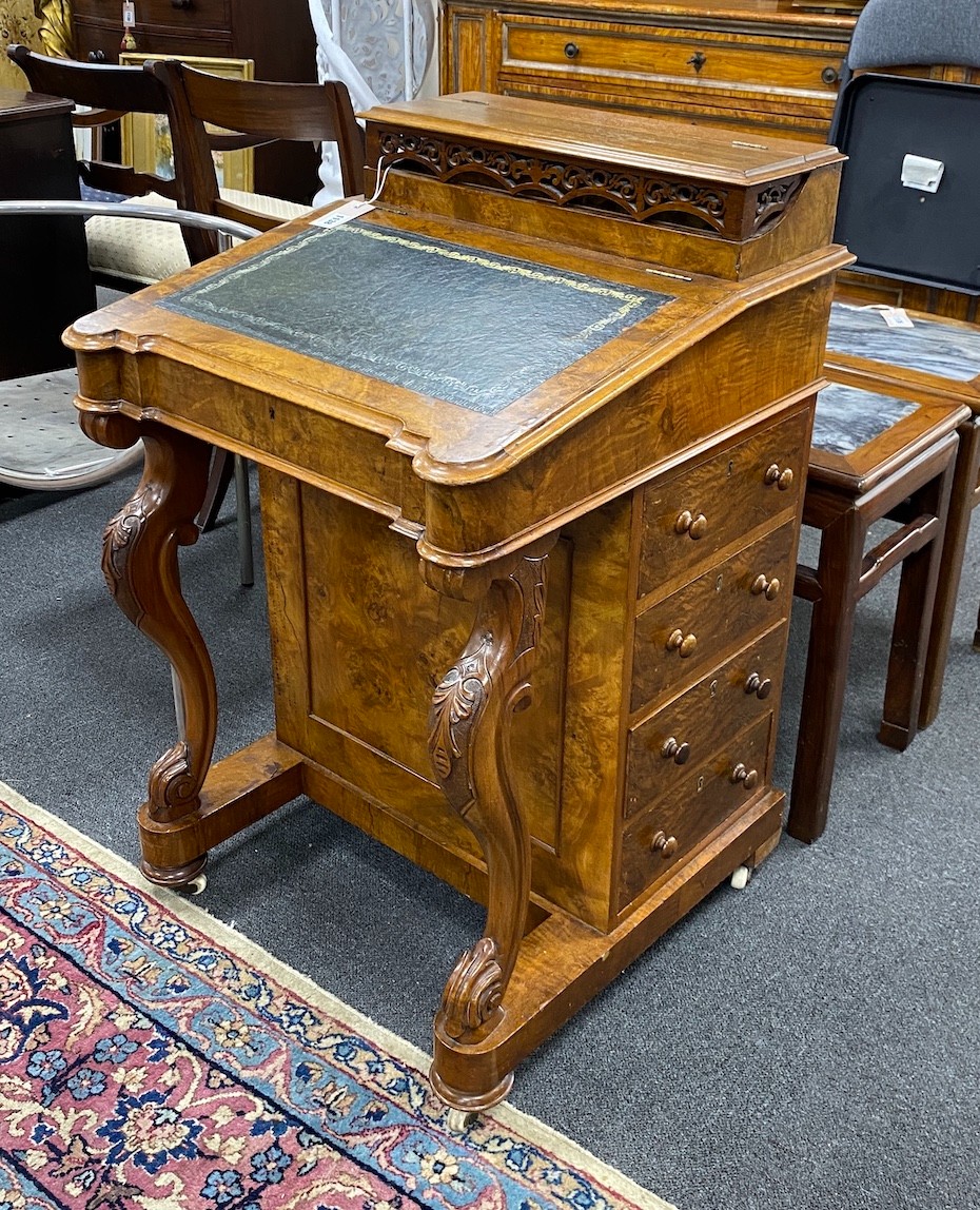 A Victorian figured walnut Davenport, with birdseye maple lined interior, height 89cm, width 56cm, depth 56cm